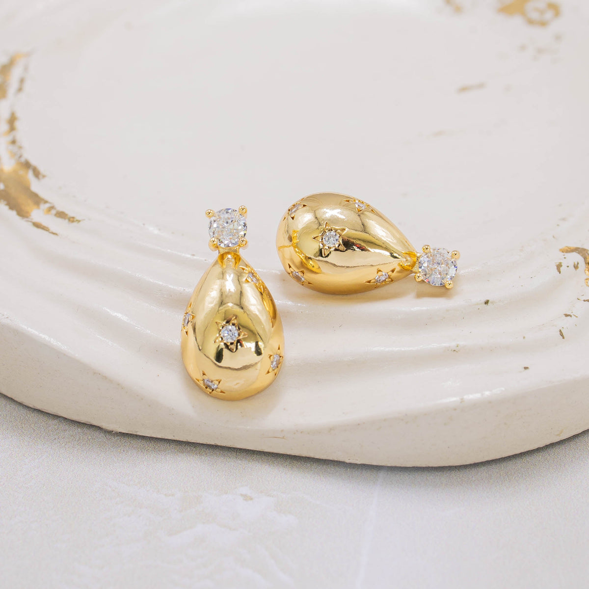 Arete gota zircón