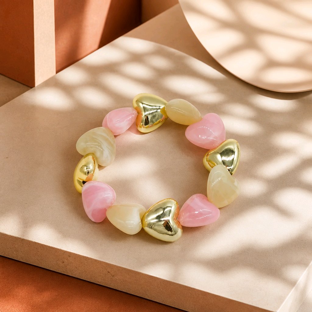 Pulsera resina corazones rosa