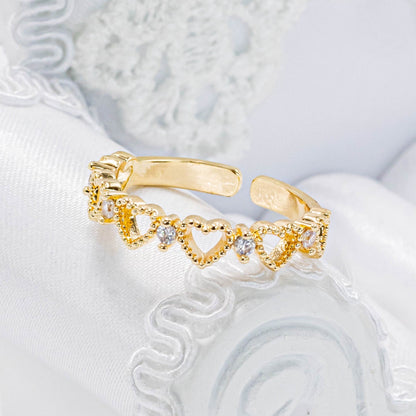 Anillo corazones zircones