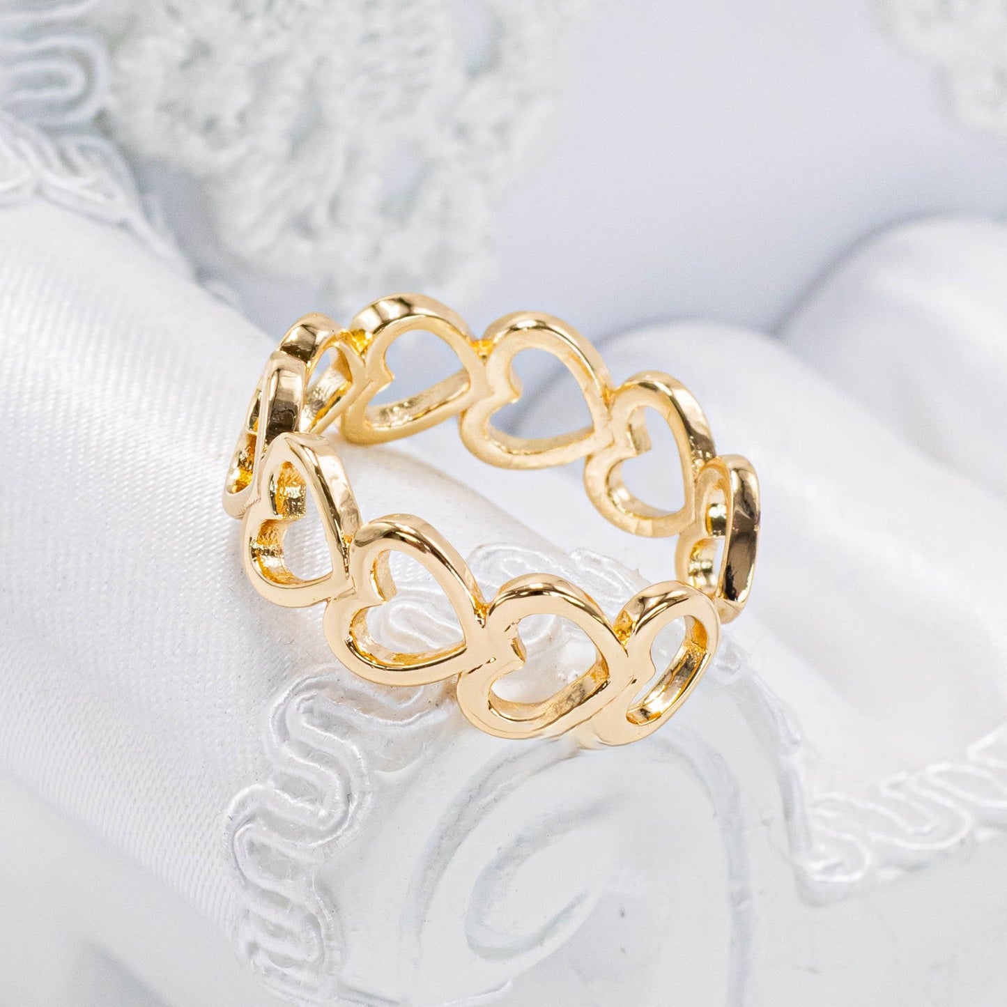 Anillo silueta corazones