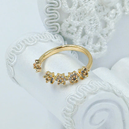 Anillo flores microzircones