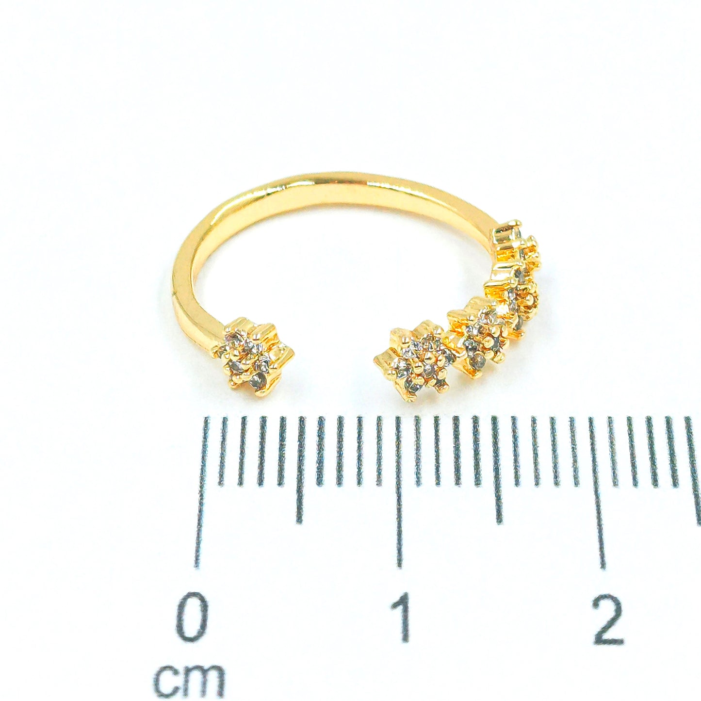 Anillo flores microzircones