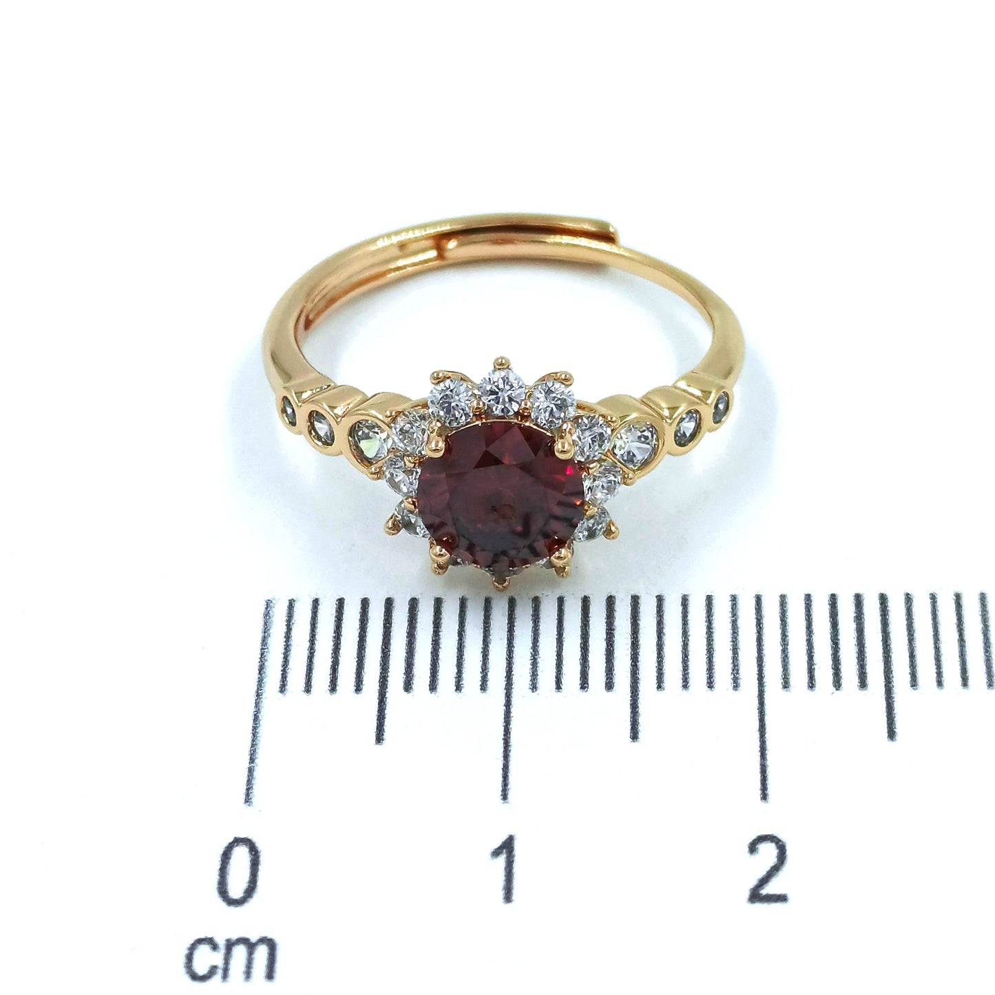 Anillo zircón rojo