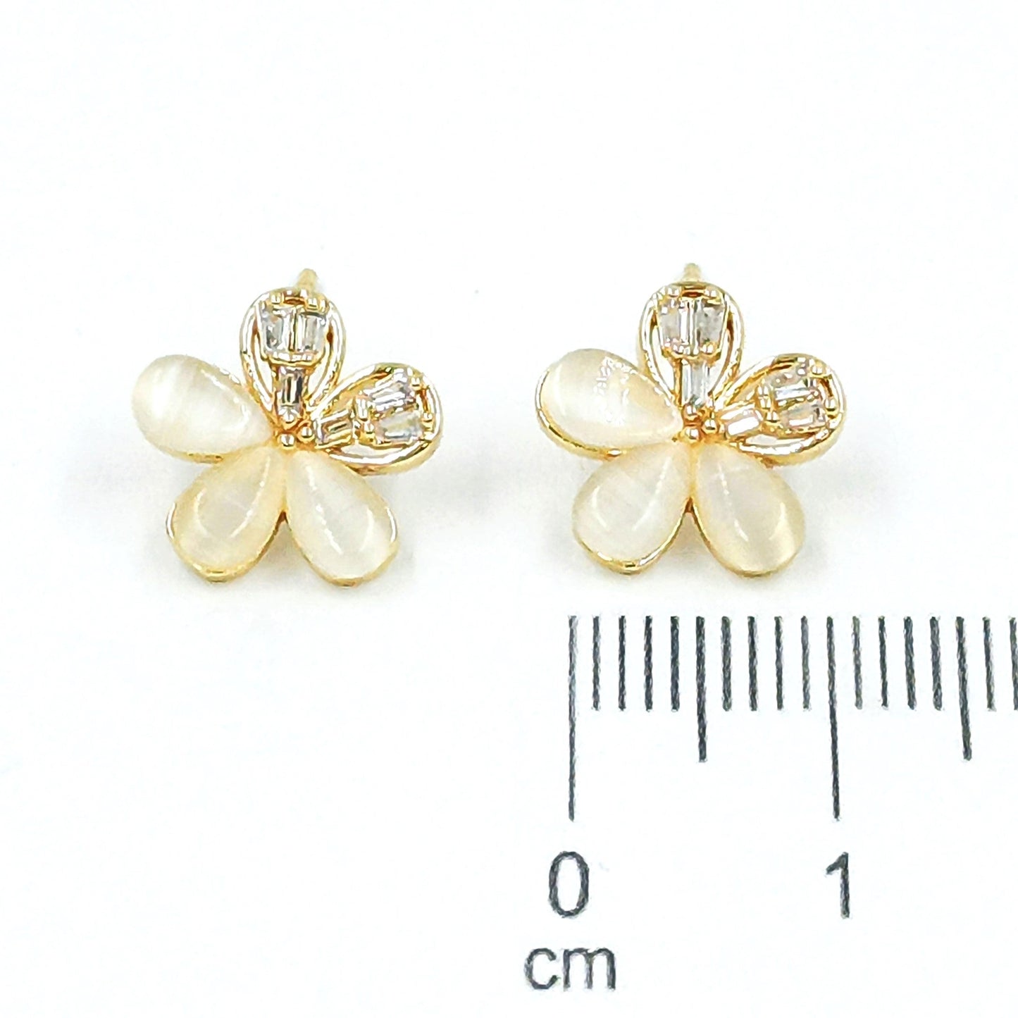 Arete flor gema baguette