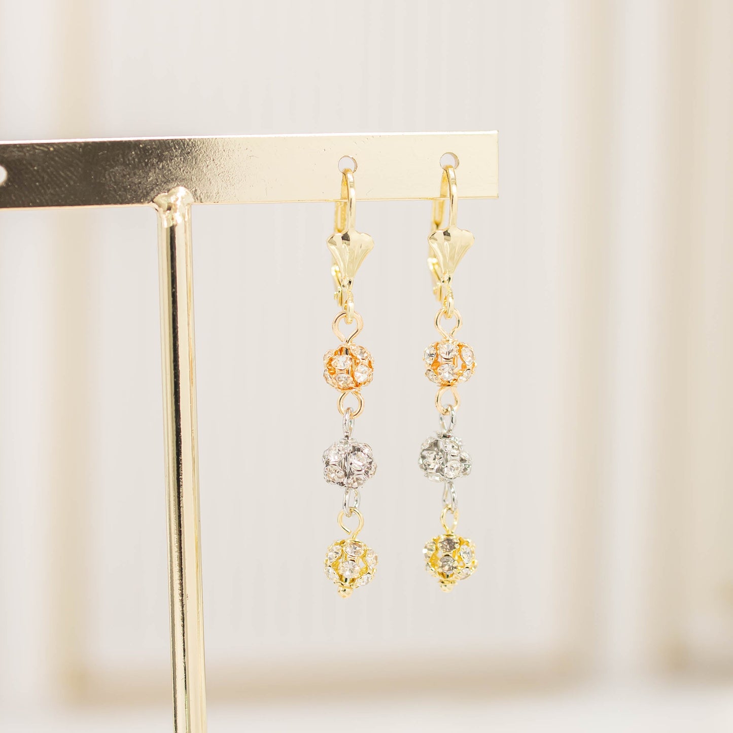 Arete bola de fuego 3 oros