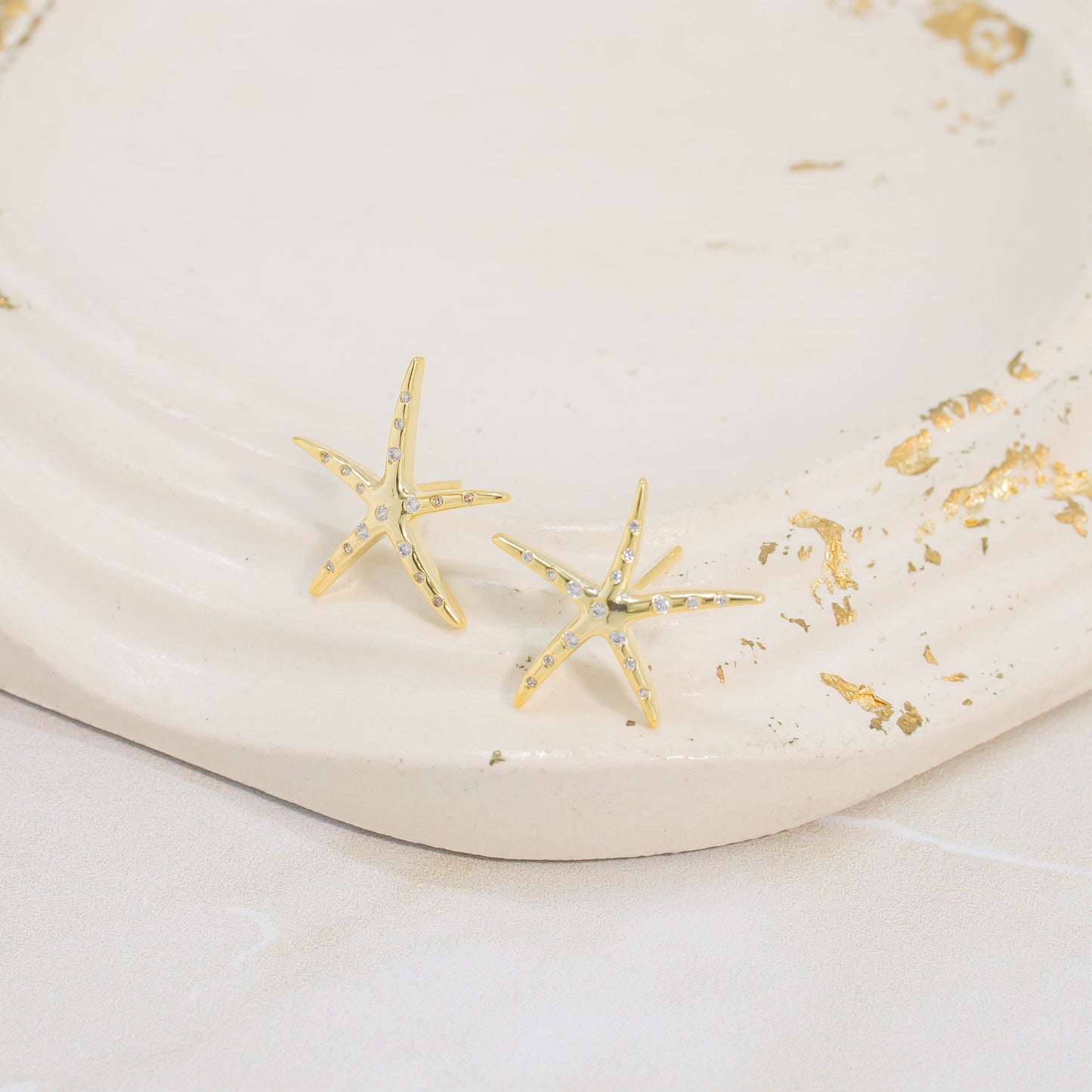 Arete estrella de mar microzircón