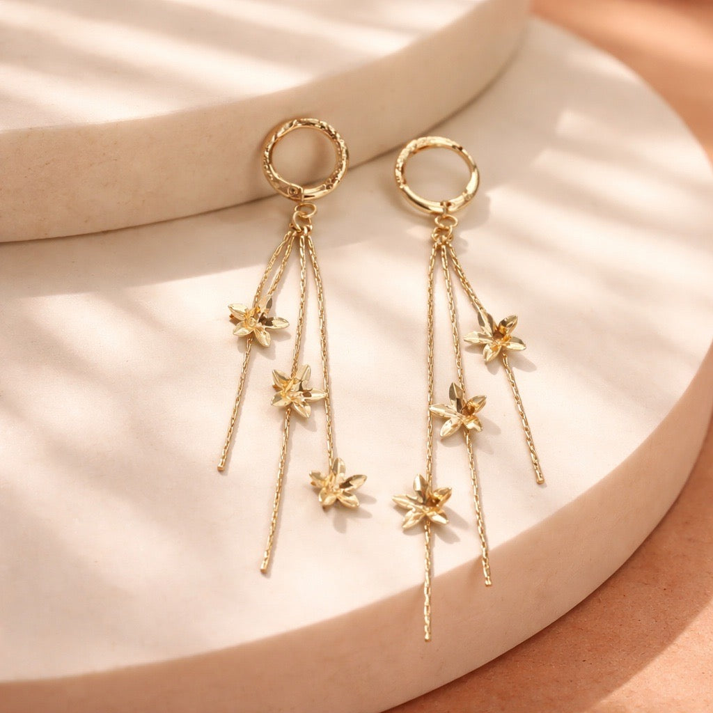 Arete lluvia flores
