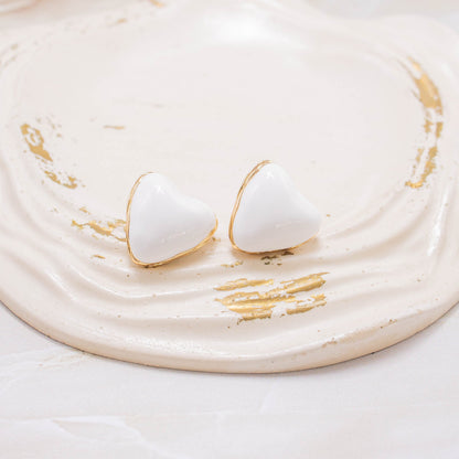 Arete corazón blanco