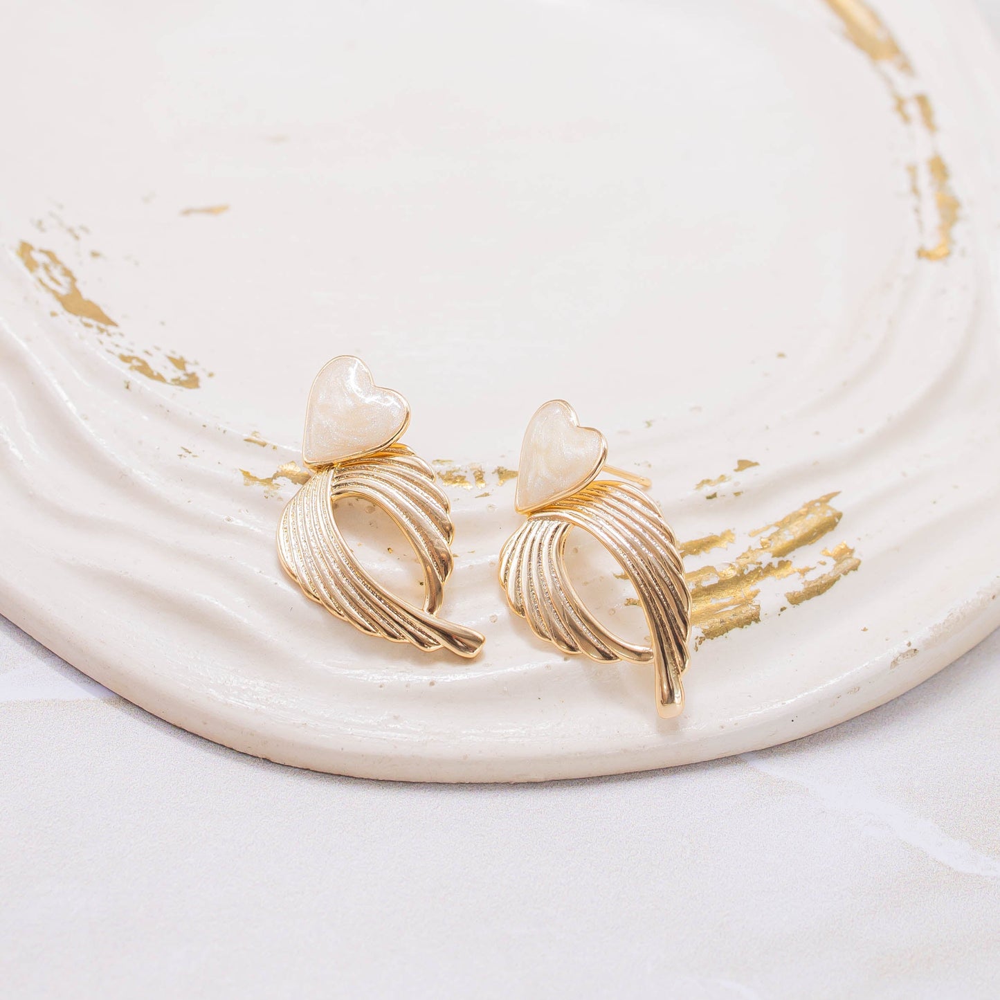 Arete corazón alas