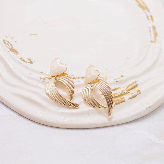 Arete corazón alas
