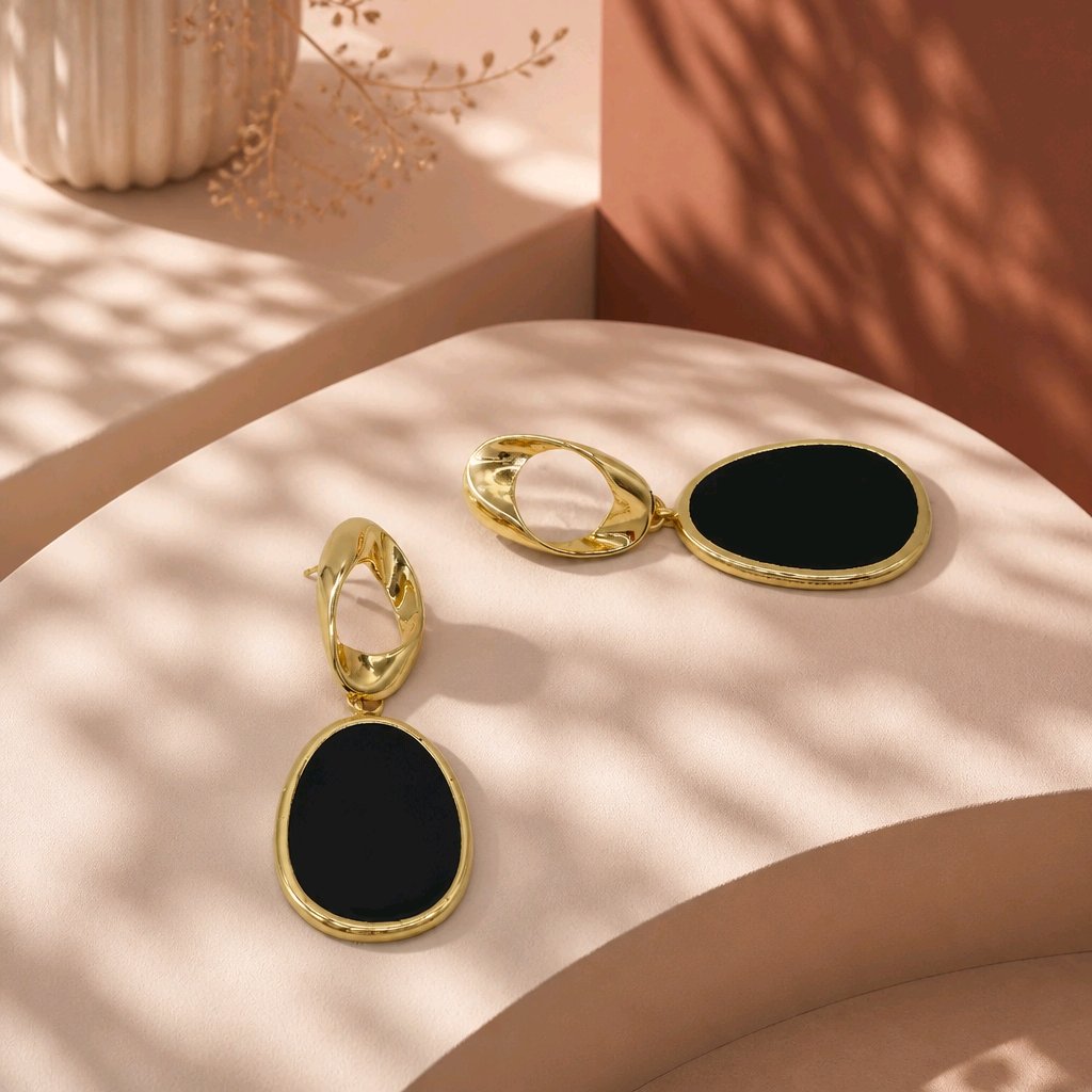 Arete óvalo negro