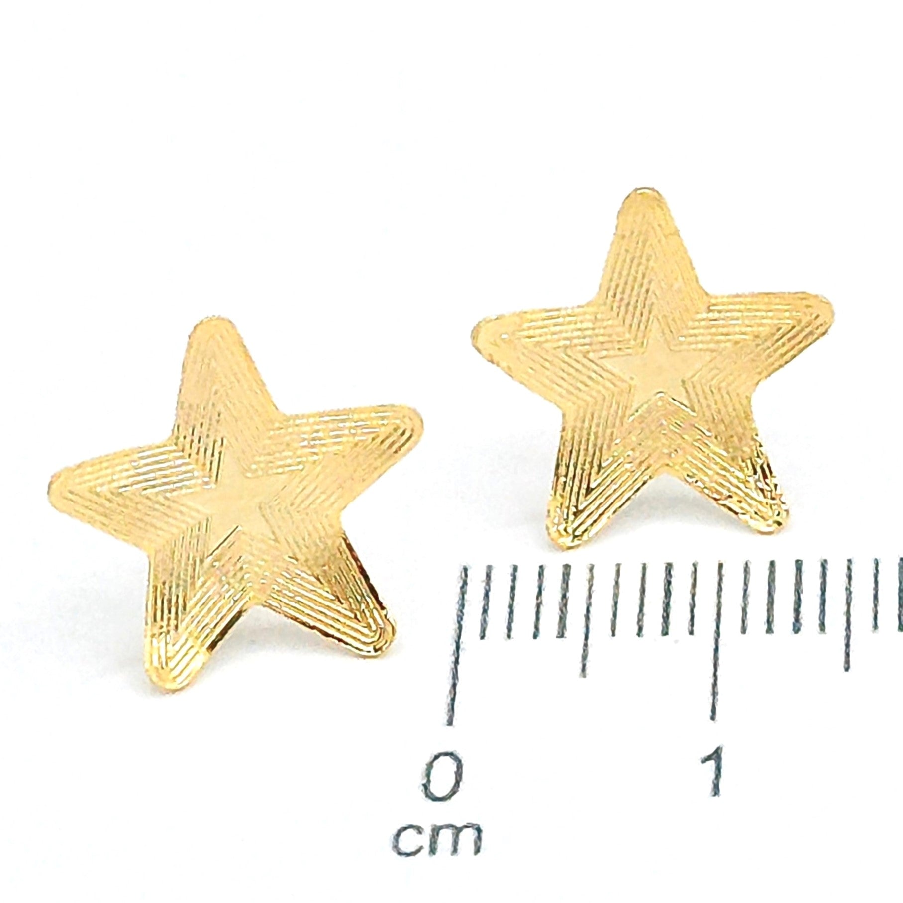 Topo bronce estrella tallada Amulí