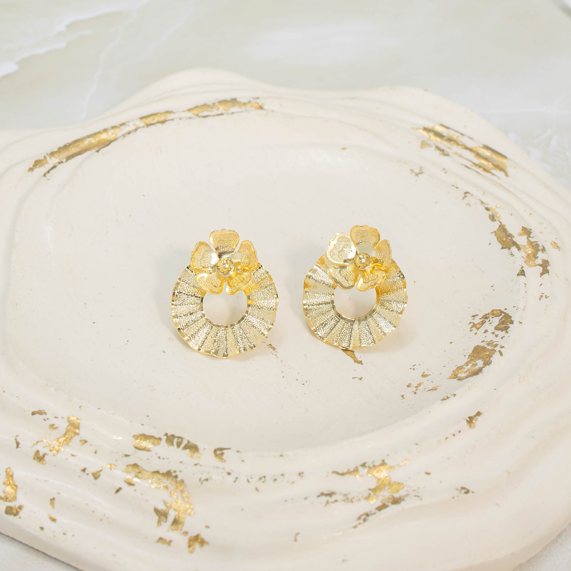 Arete bronce círculo flor Amulí