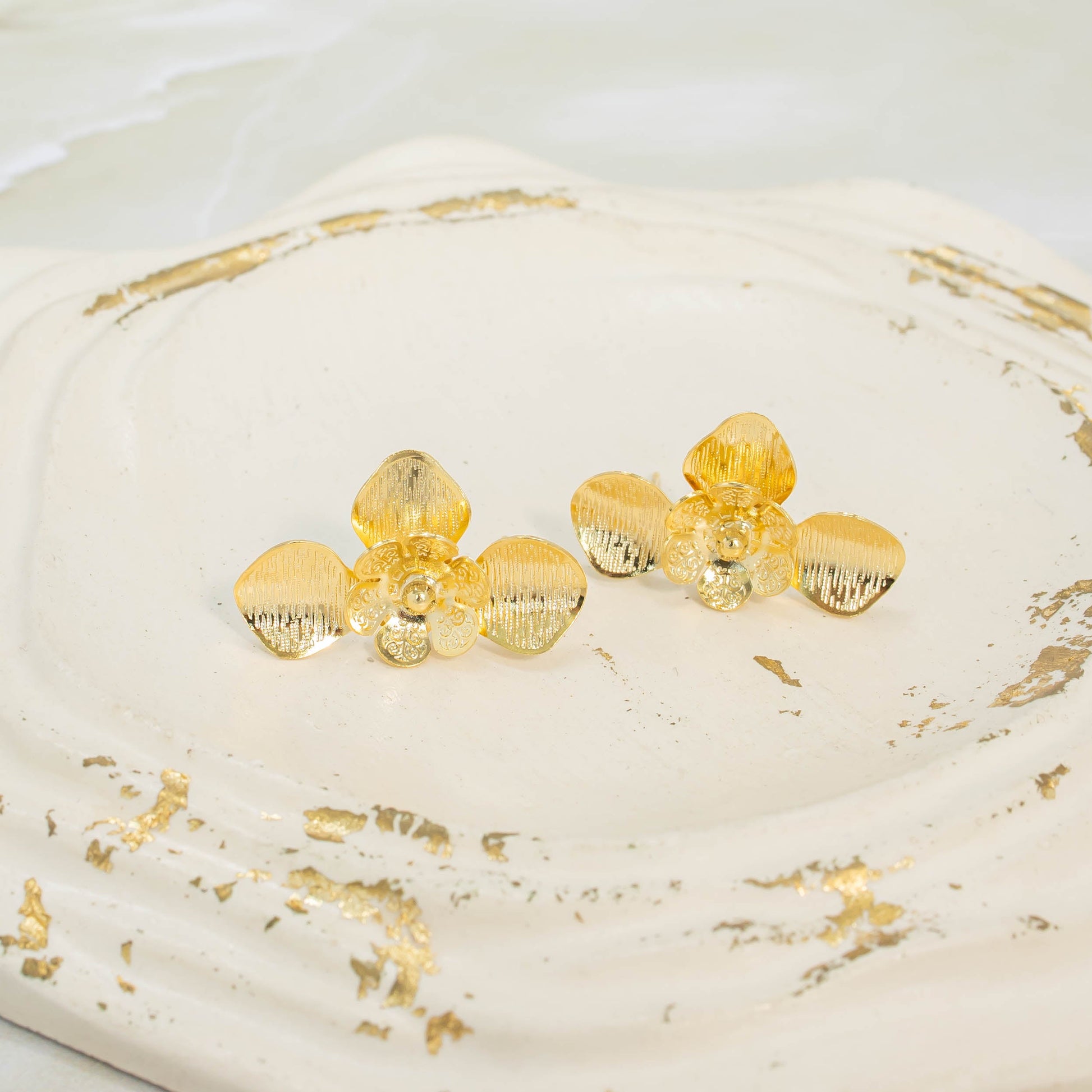 Arete bronce media flor Amulí