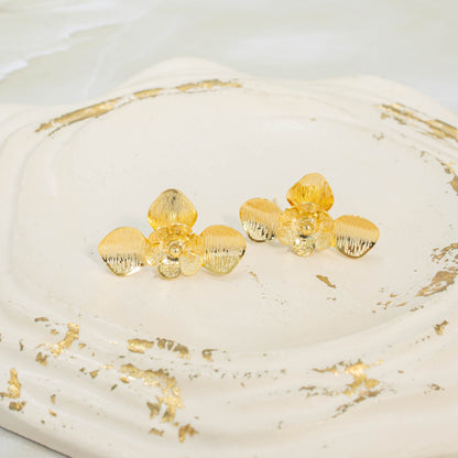 Arete bronce media flor Amulí