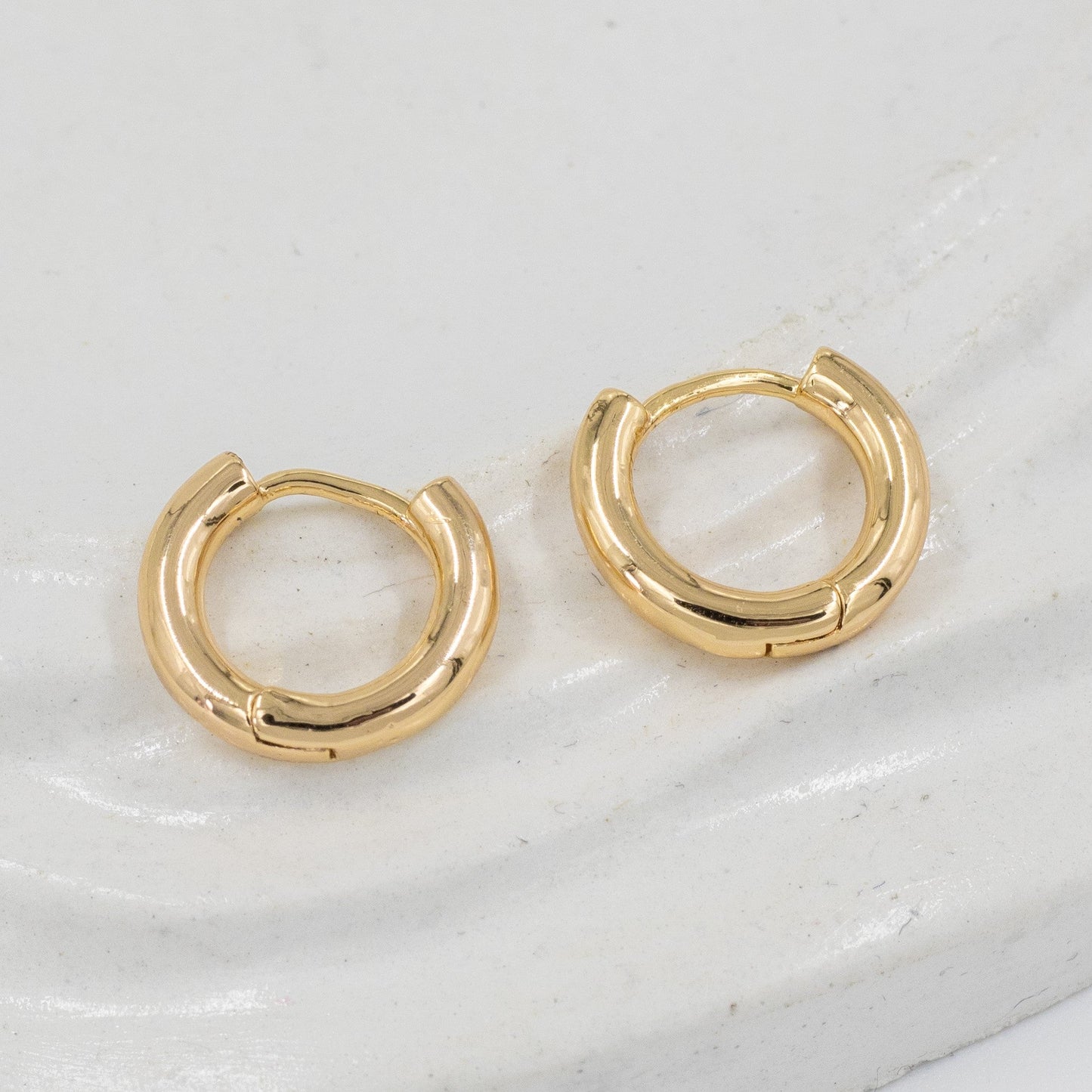 Candonga pequeña lisa 1,4cm Amulí