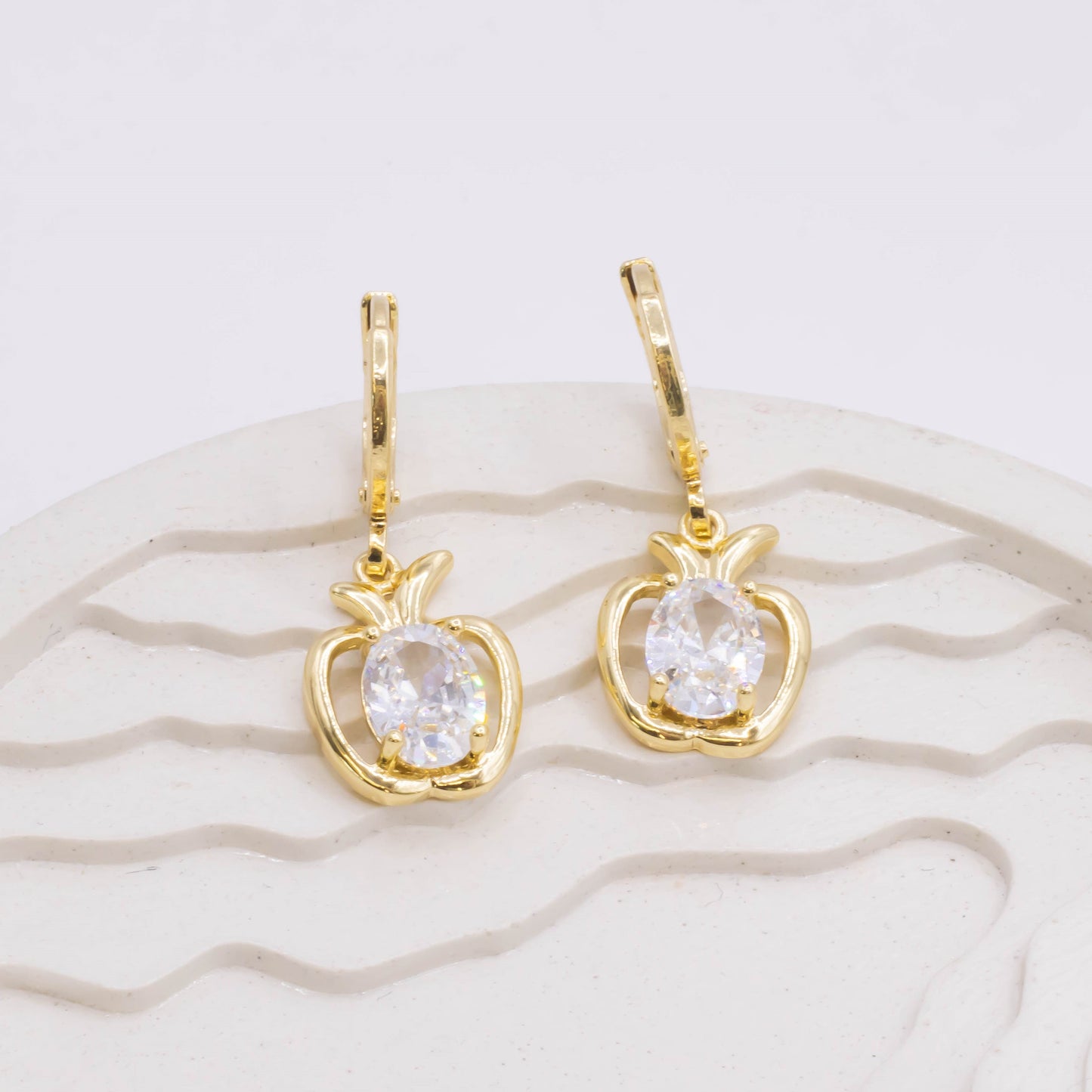 Cdga pequeña manzana zircón