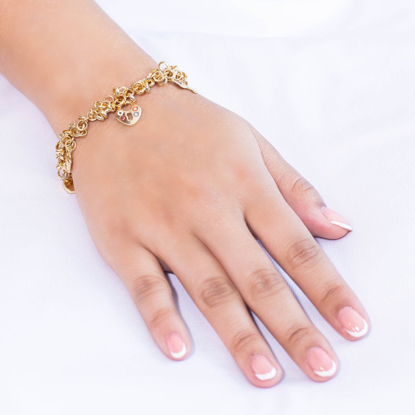 Pulsera dije corazones candados 