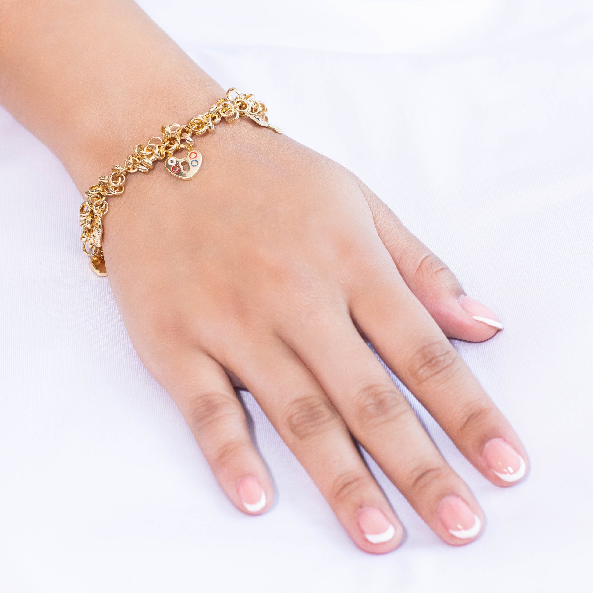 Pulsera dije corazones candados 