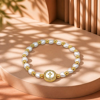 Pulsera perla dije nacar cruz