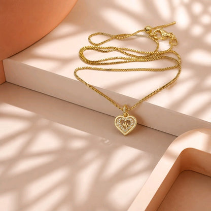 Collar rodio corazón ondas