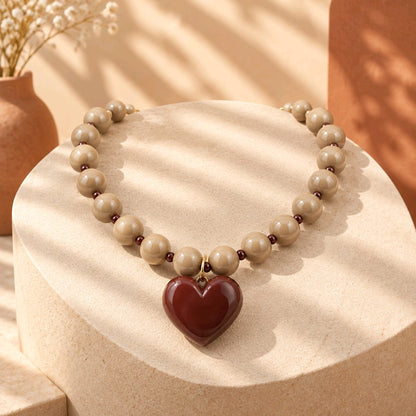Collar rodio café corazón marrón