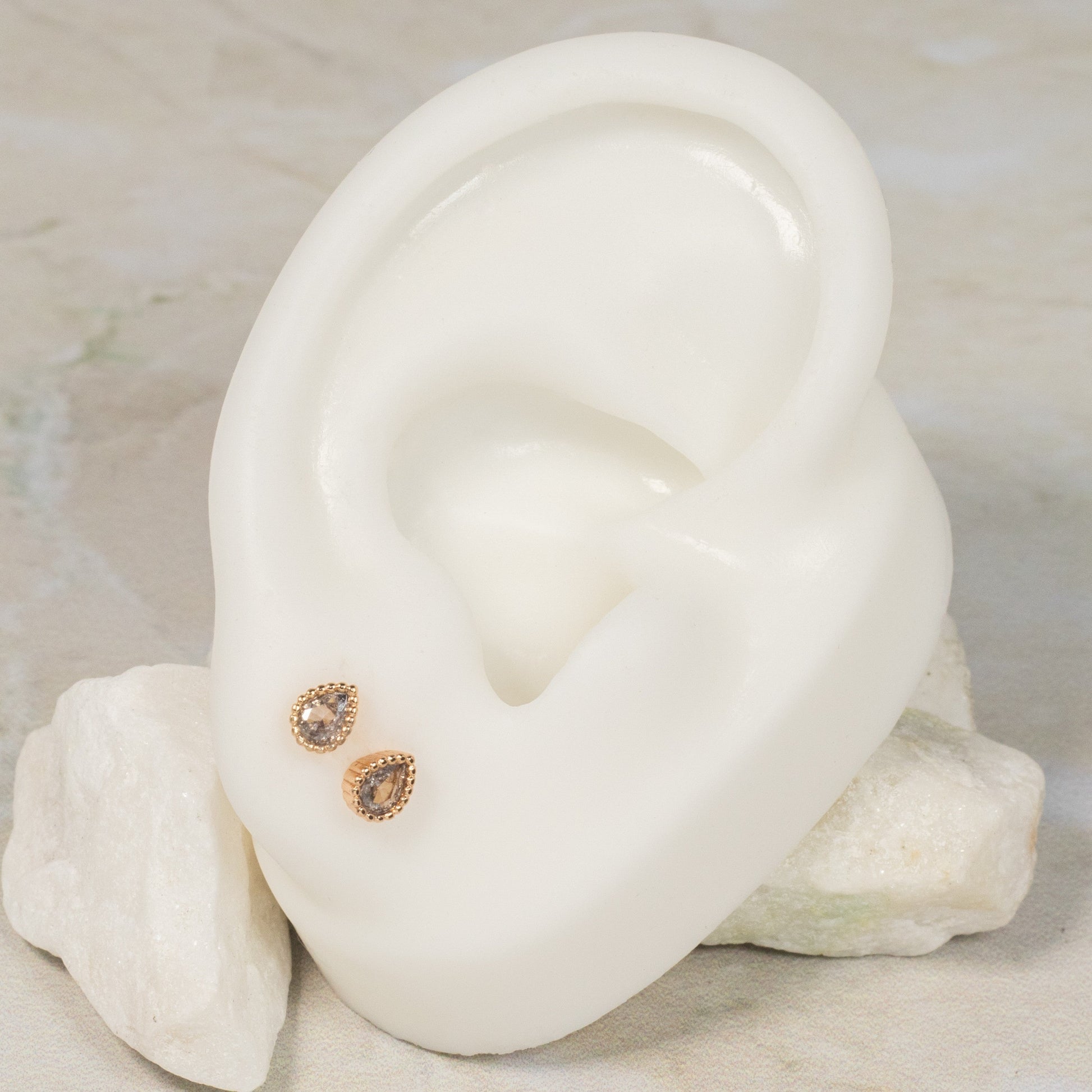 Topo seguridad gota zircón