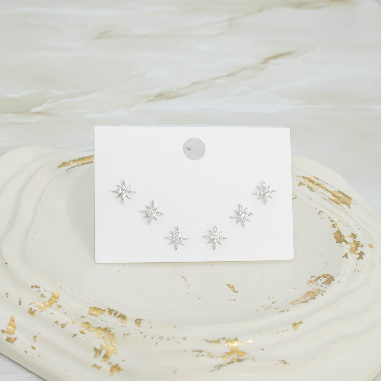 Topo trío estrellas P