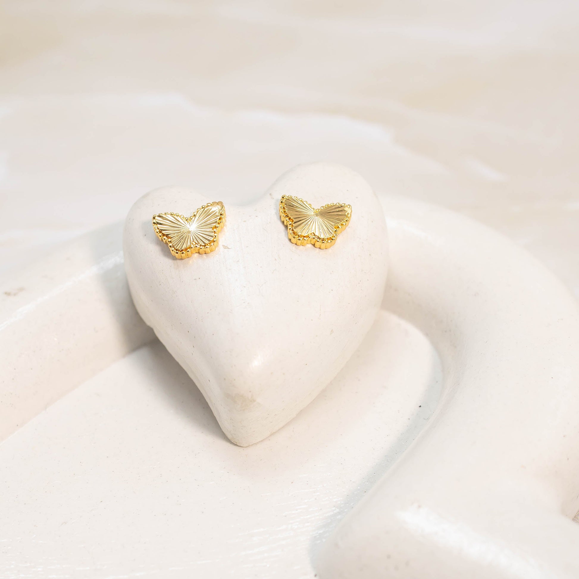 Topo mariposa diamantada