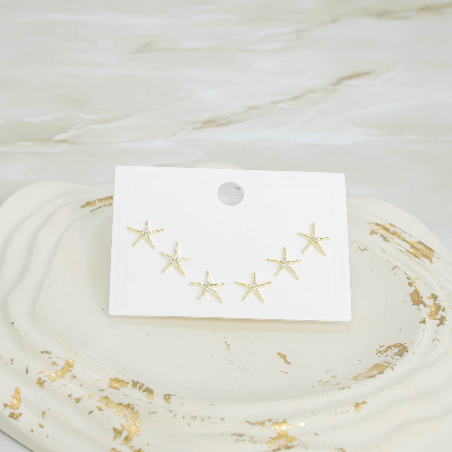 Topo trío estrellas de mar