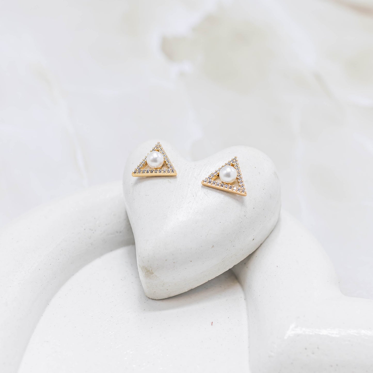 Topo triángulo perla