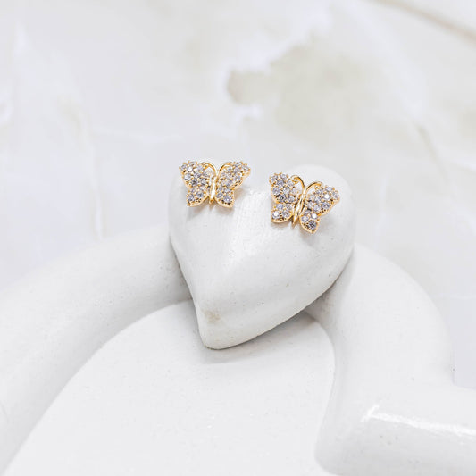 Topo mariposa zircones