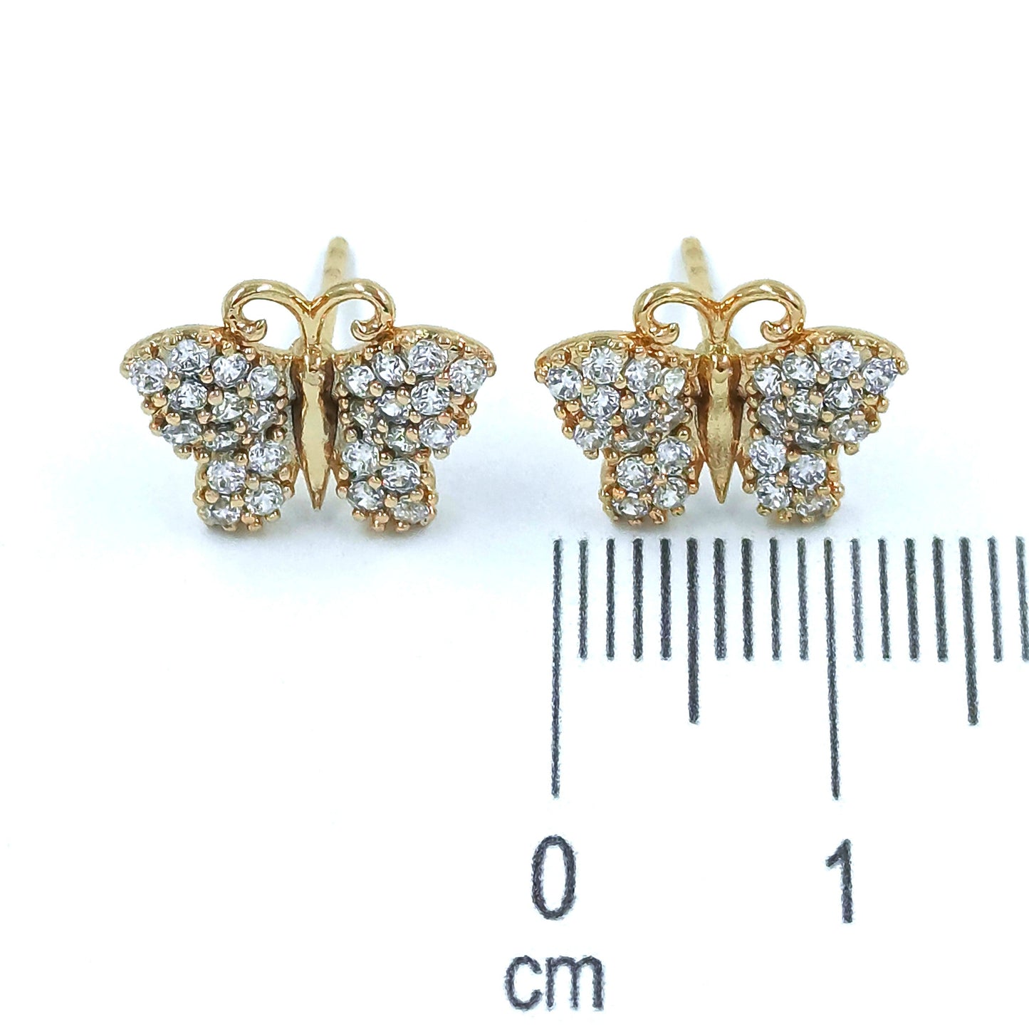 Topo mariposa zircones