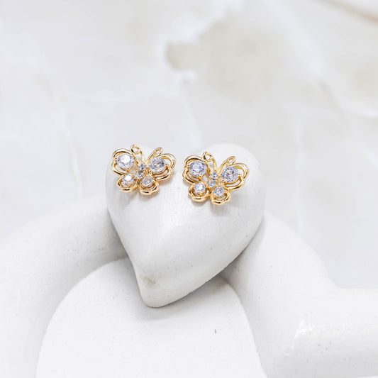 Topo mariposa zircón