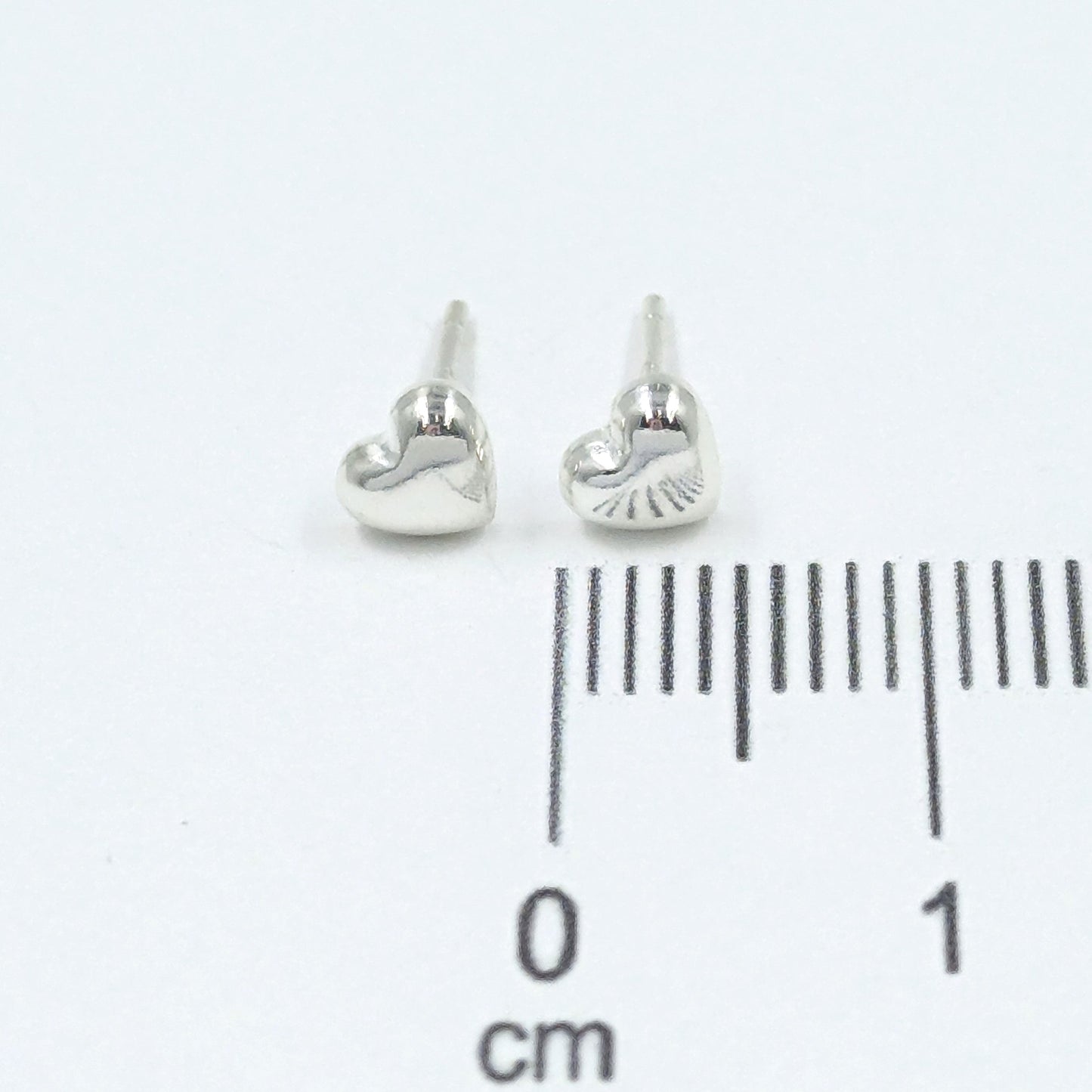 Topo plata corazón relieve